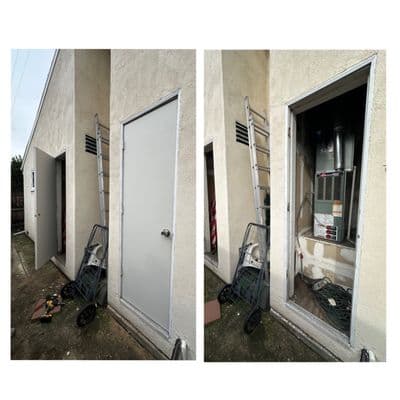 New exterior utility door installed and trimmed on a stucco wall